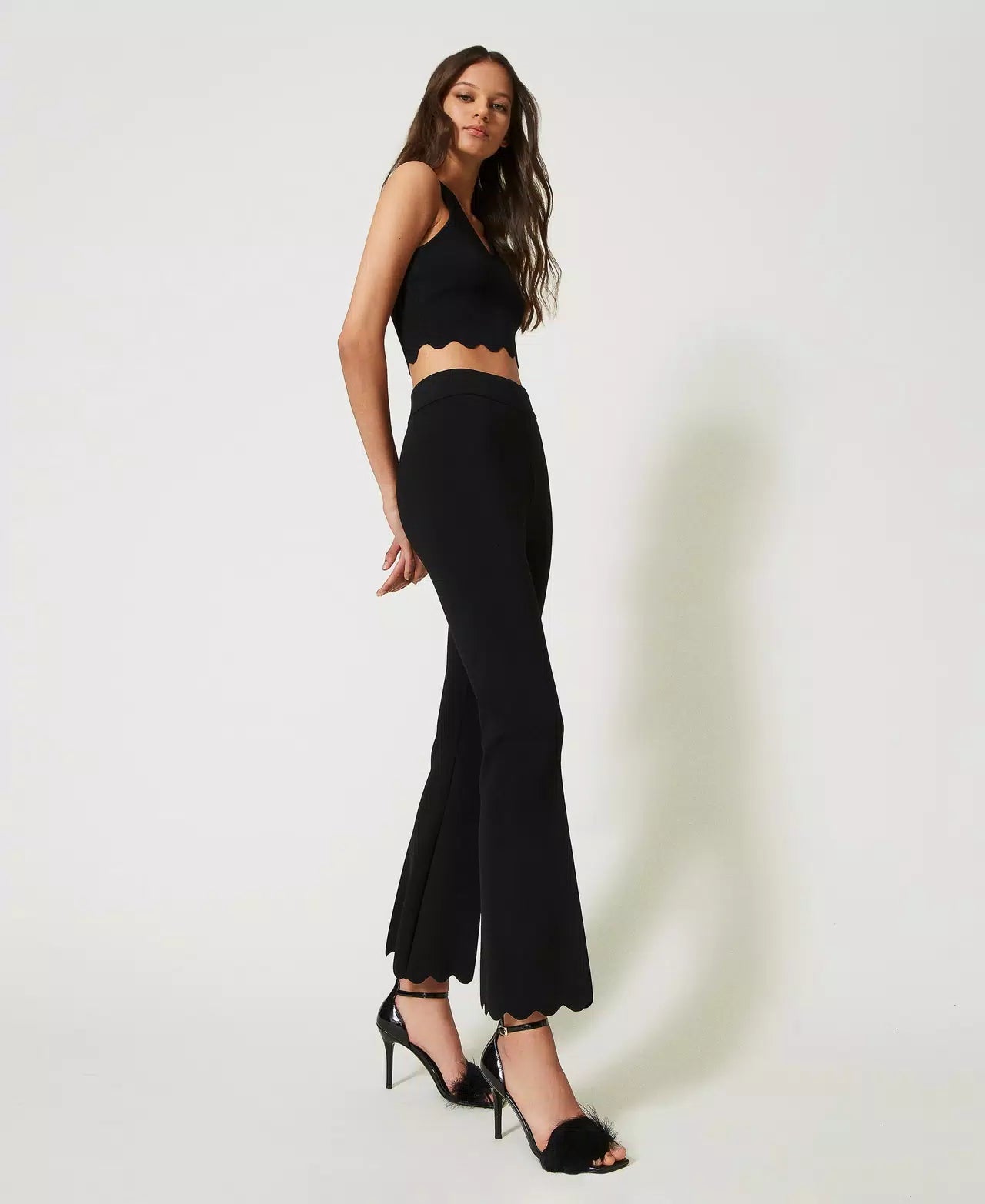 Twin Set Flared knit trousers with scalloped hem