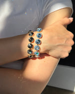 Load image into Gallery viewer, Rebekah Price Light Sapphire Rivoli Bracelet- Gold
