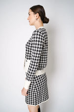 Load image into Gallery viewer, D. EXTERIOR BUTTON KNIT CARDIGAN IN CLASSIC HOUNDSTOOTH PRINT
