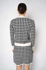 Load image into Gallery viewer, D. EXTERIOR BUTTON KNIT CARDIGAN IN CLASSIC HOUNDSTOOTH PRINT
